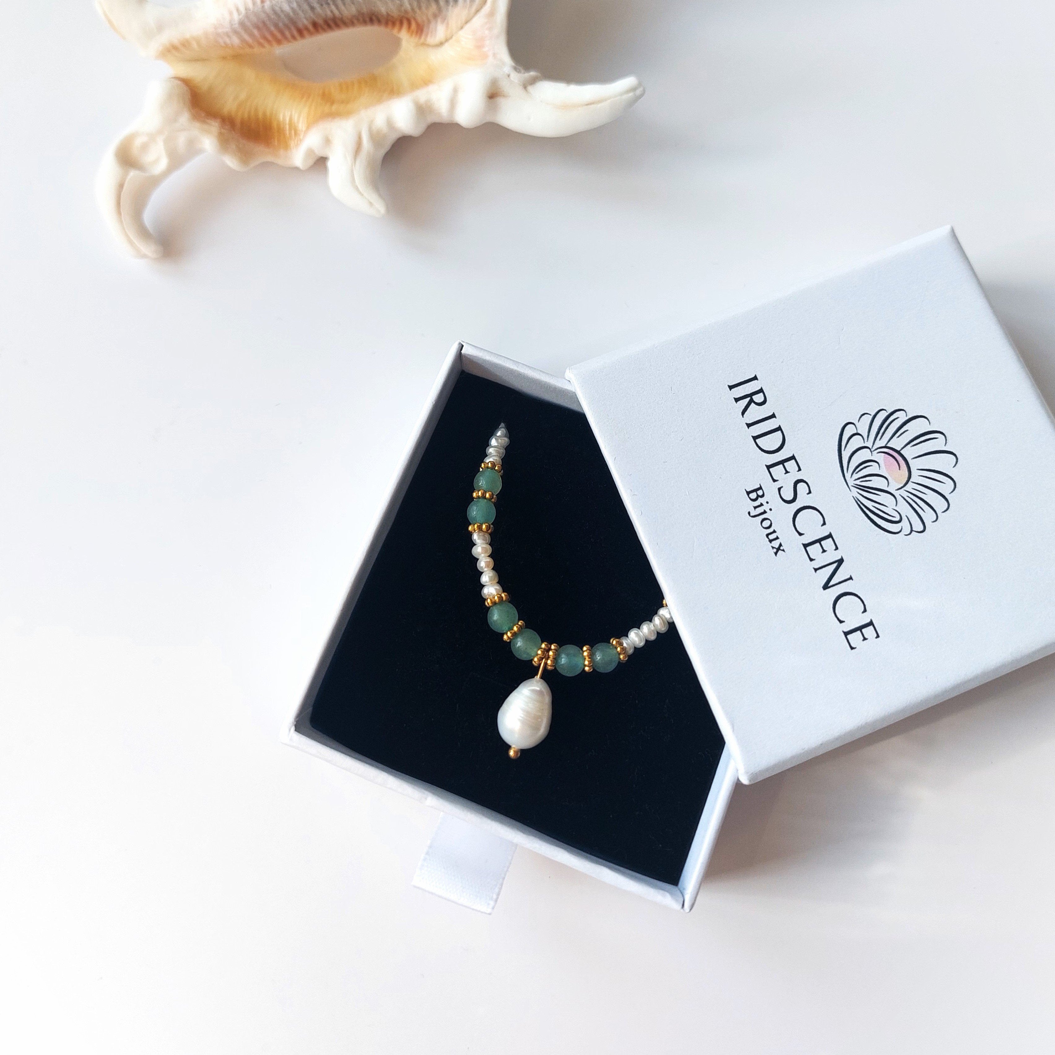 Collier en aventurine dans son packaging