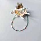 collier ras de cou avec des perles d'eau douce et pierres d'aventurine verte