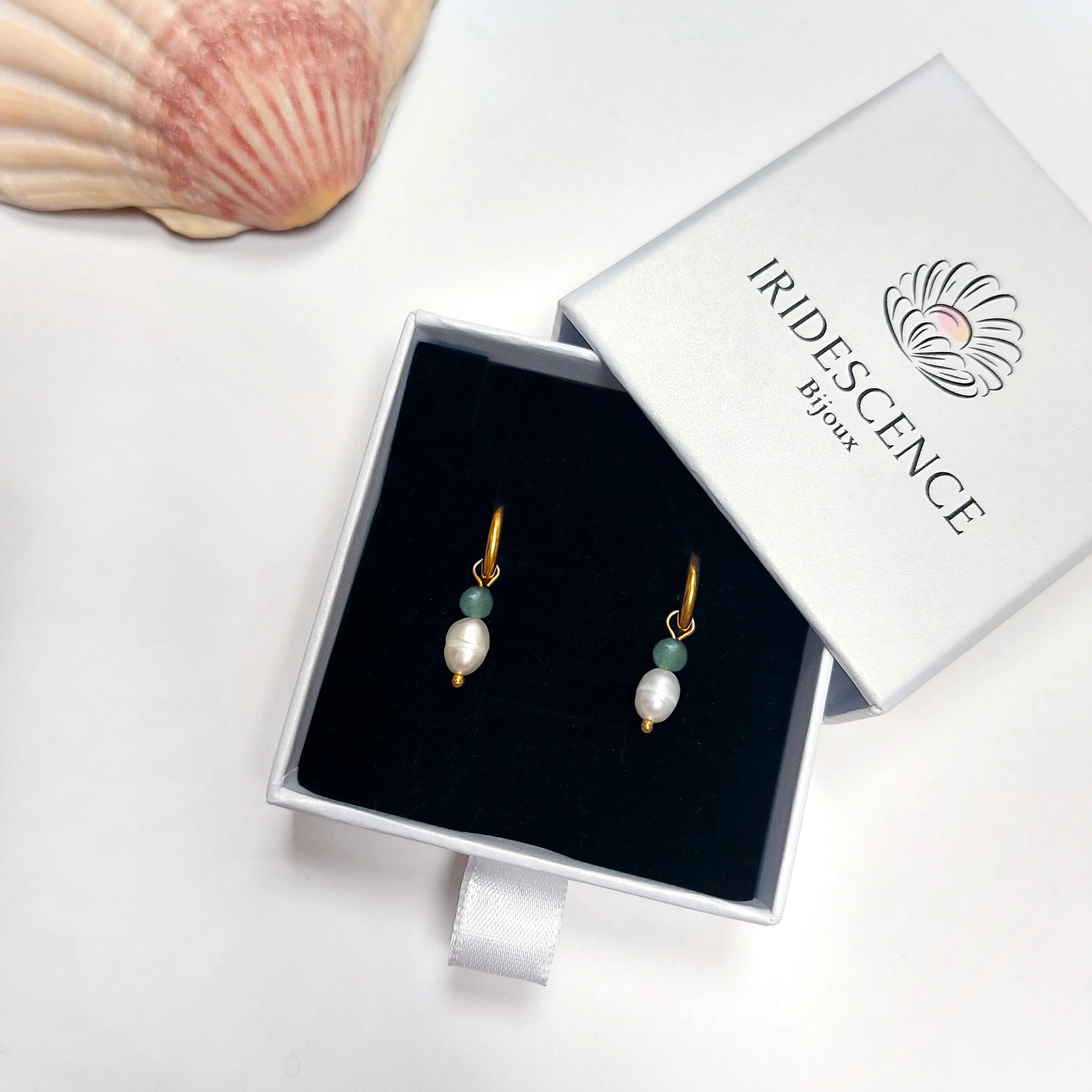Boucles d'oreilles en aventurine dans son packaging