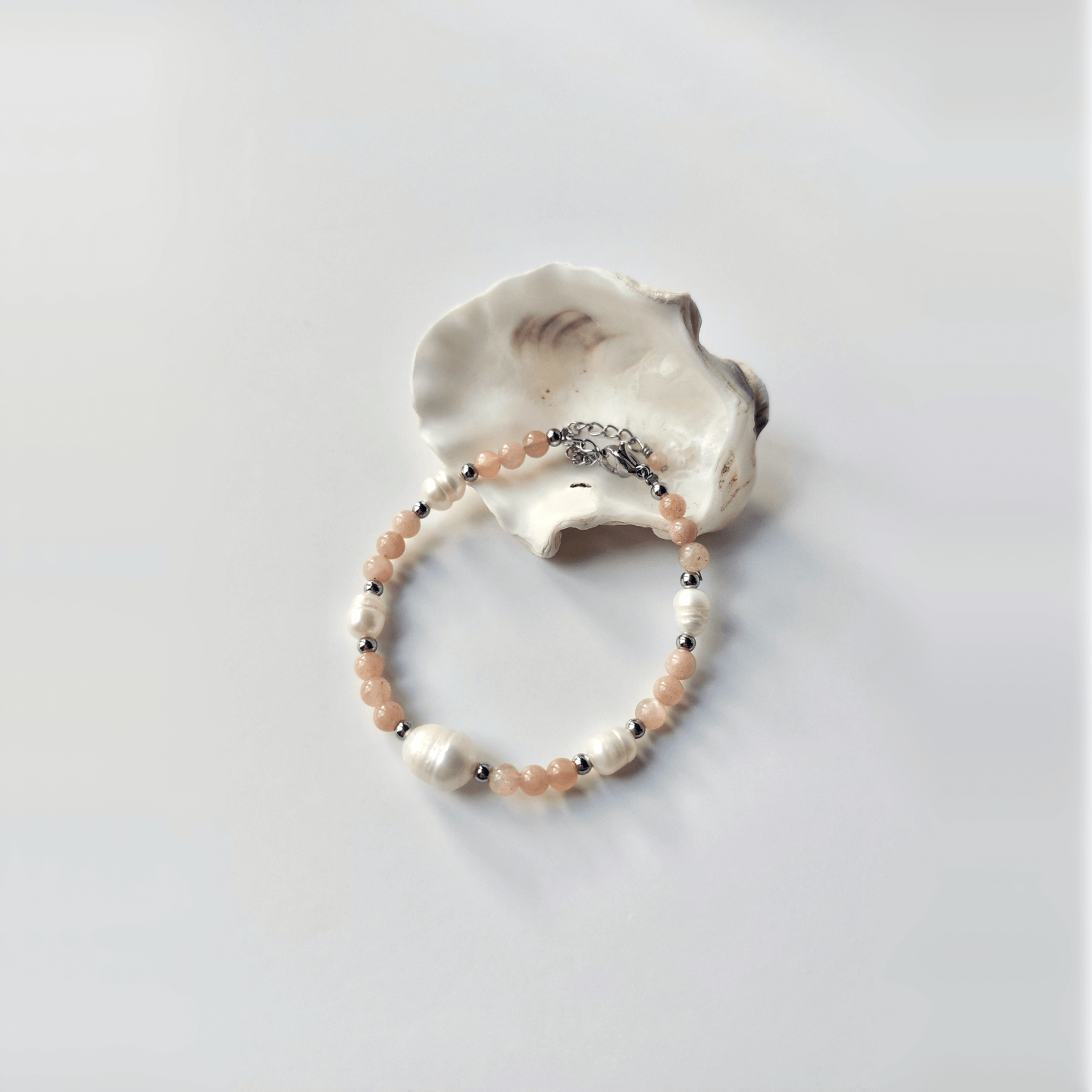 bracelet pour femme en acier inoxydable argenté, perles d'eau douce et pierres de soleil rose