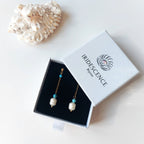 Boucles d'oreilles en turquoise dans son packaging