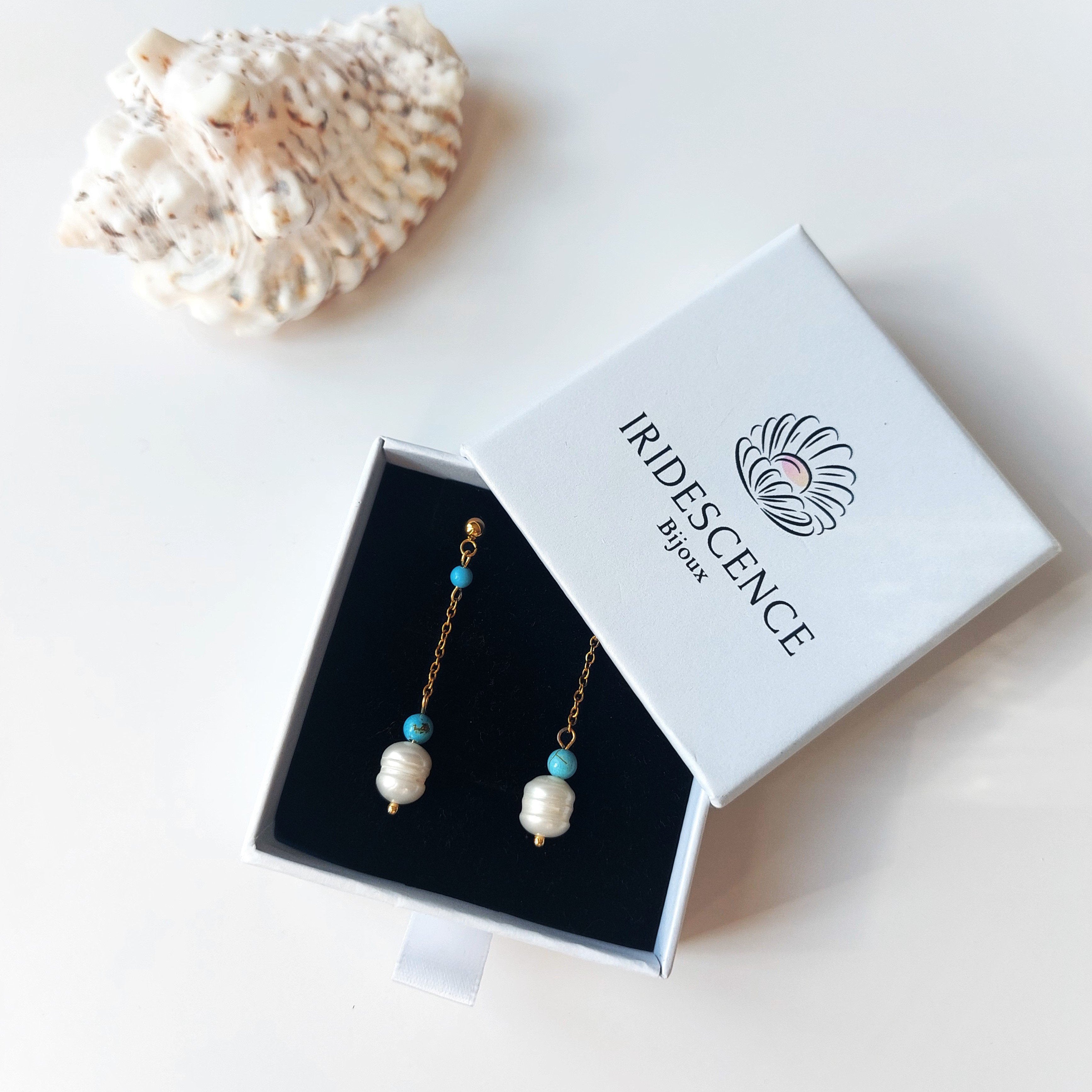 Boucles d'oreilles en turquoise dans son packaging